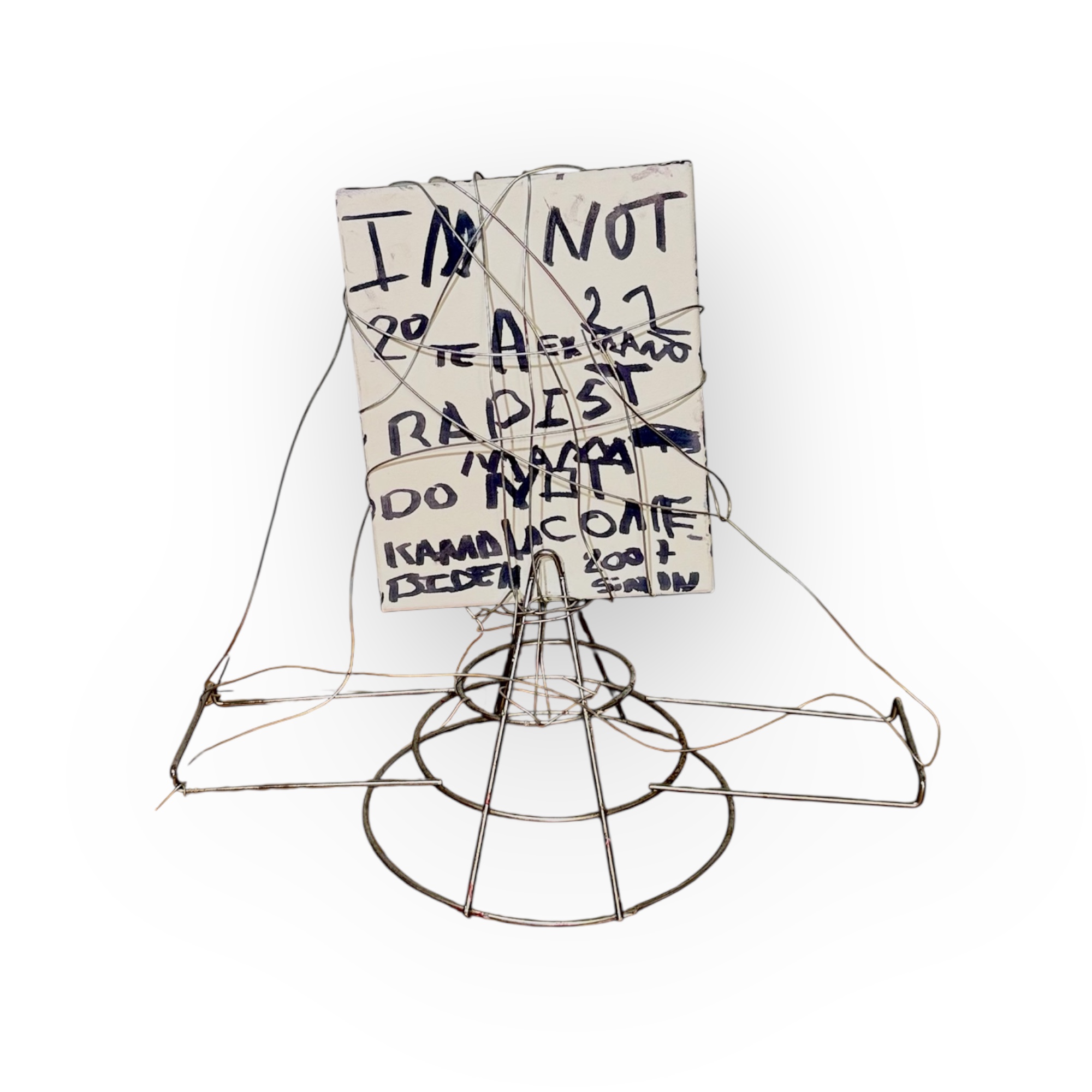 Wire sculpture and handwritten placard by Simon Gama